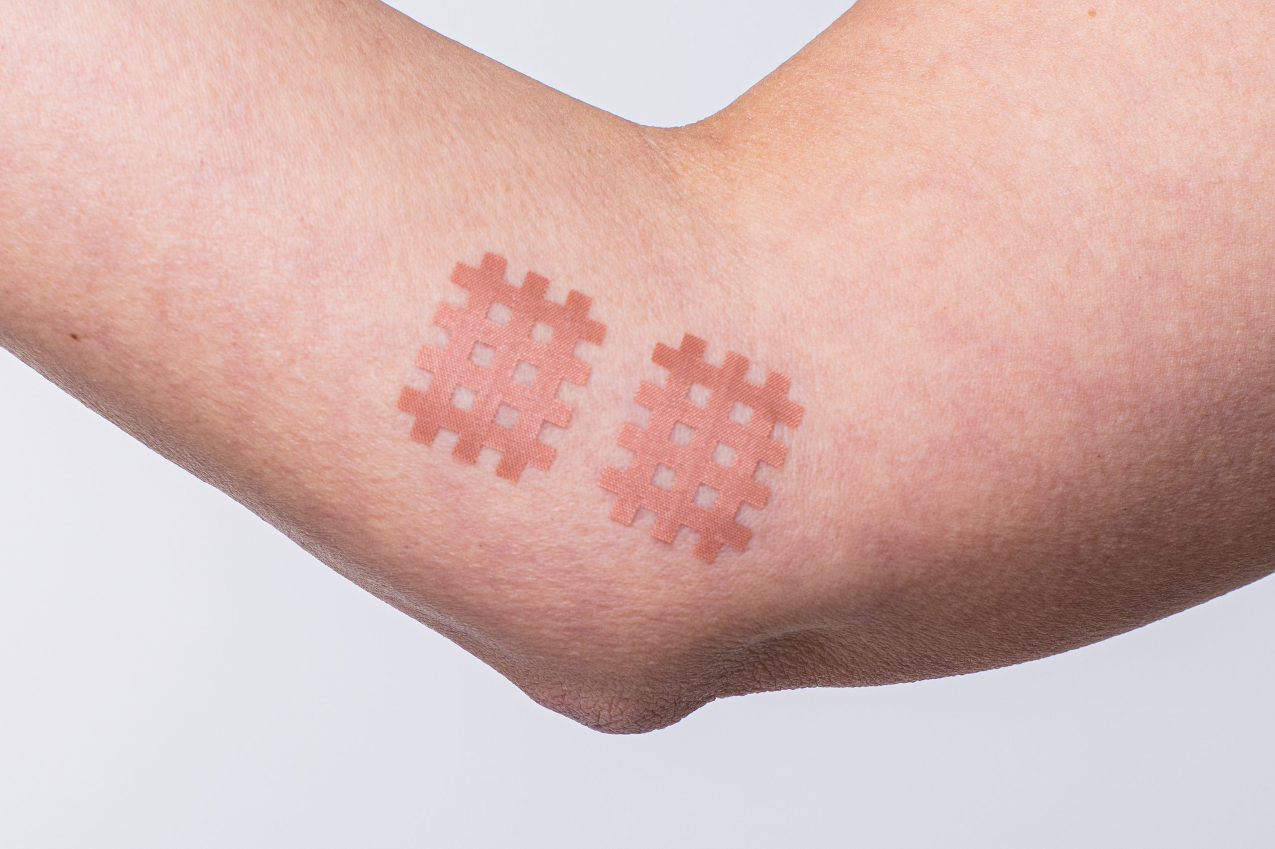 cross on elbow pain