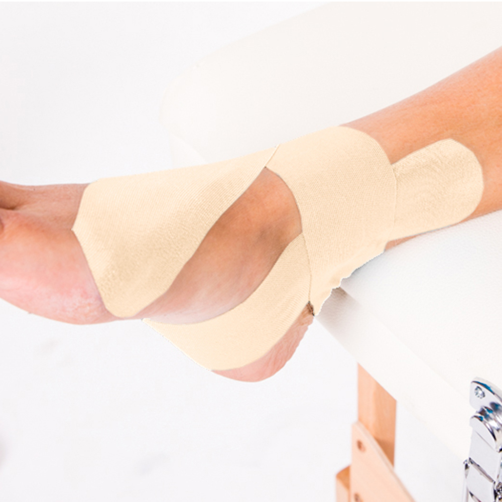 gentle kinesiology tape on ankle